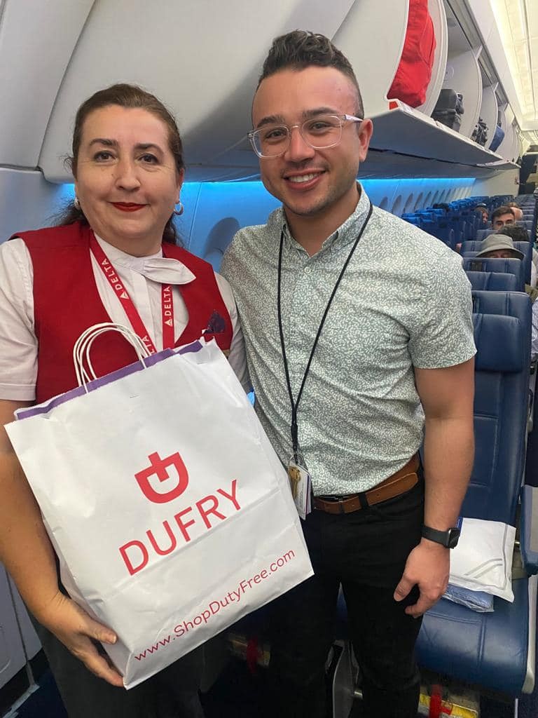 Kidell with team member on aircraft